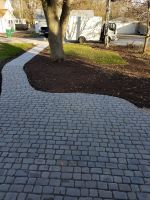 Beautiful completed Courtstone sidewalk, for visual depth, the homeowner chose a color blend of Dawn Mist and Pebble Taupe.