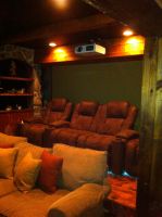 Plenty of room for the whole family to enjoy movies and sporting events in this media room