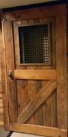 Tight on space? This unique sliding door was made using a vintage iron gate mated with century old sealed reclaimed lumber.