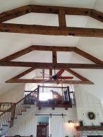 Hand hewn barn beams add warmth to our Twin Lakes build