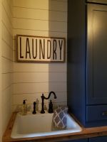 Shiplap character added to this Laundry room sink area