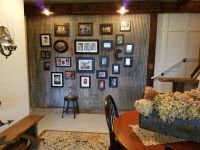 Photo wall created for our Twin Lakes build lower level