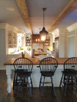 True beauty is in the details of this recently remodeled Wisconsin Country Kitchen. Century Old Barn Beams, stunning crown molding, ship lap, hand crafted islands, custom made cabinetry, and more, all come together to complete this beautiful large family kitchen!