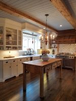 This Wisconsin Country Homes stunning 2017 Remodel is filled with intricate details throughout-from custom crown molding to the beautiful custom tiled back splash behind the cook top!