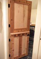 Quaint dutch door made for this lakeside laundry room